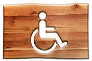 Man on wheelchair - sign in wood.
