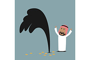 Arab businessman standing near oil