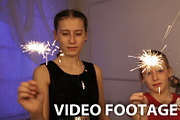 two girls with sparklers