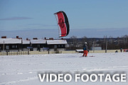 Winter snowkiting on the field.