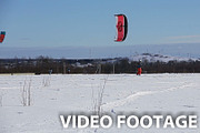 Winter snowkiting on the field.