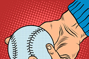 The hand with a baseball