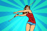 girl athlete throwing javelin