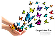 Hands Releasing Colorful Butterflies