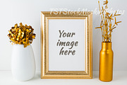 Frame mockup with golden vase 