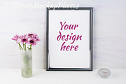 Frame mockup with lilac daisies