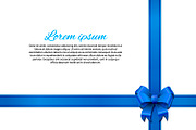 White gift card with blue bow