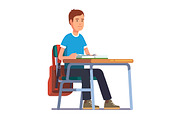 Student sitting at his school desk