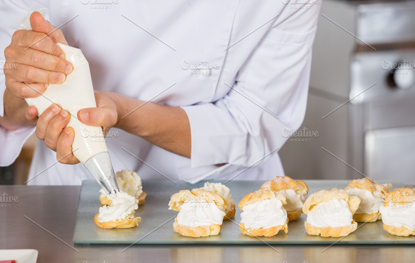 Pastry chef decorating | High-Quality Food Images ~ Creative Market