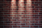 Brick wall illuminated.