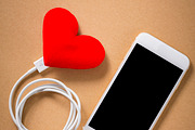 Blank smartphone and heart