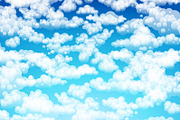 Blue sky with clouds. Vector