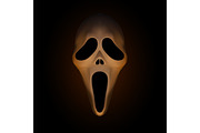 Spooky halloween mask on dark brown