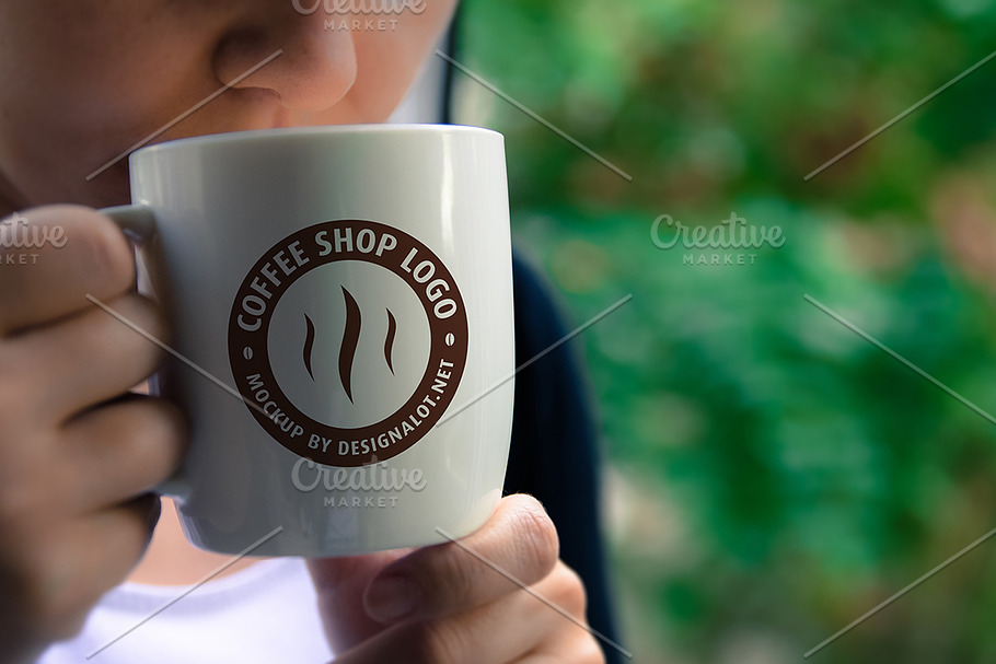Woman Holding a Coffee Mug Mockup #3