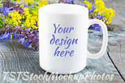 White mug mockup with lilac flowers 