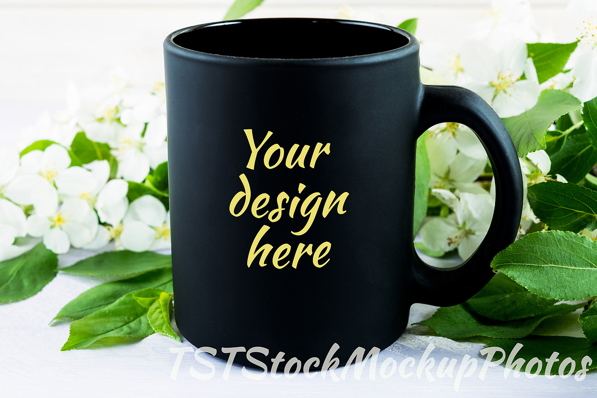 Black mug mockup with apple blossom in Product Mockups - product preview 8