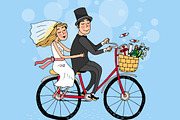 Bride and groom on a bicycle