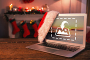 Santa hat hanging on laptop