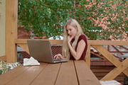 Young woman communicate using laptop