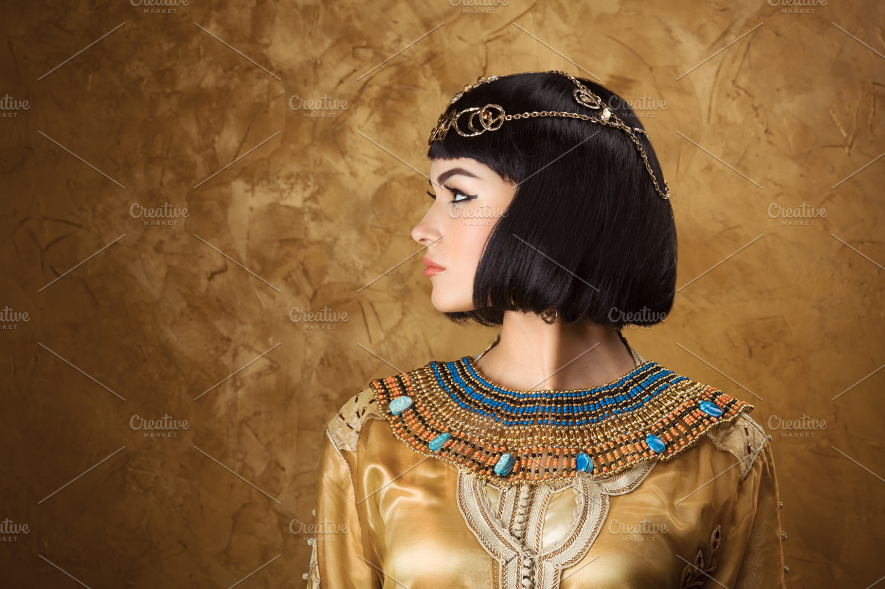 Beautiful Woman Like Egyptian Queen Cleopatra On Golden Background