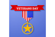 Golden award with veterans day text on banner.
