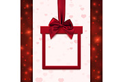 Red banner with  ribbon and bow in form of gift.