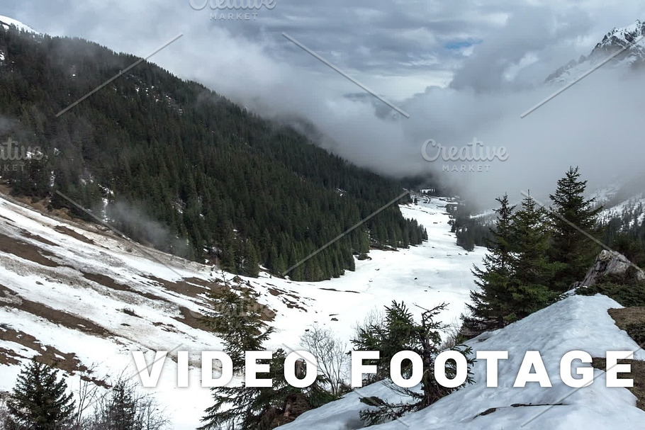 Clouds motion in the Alps mountains. Time-lapse