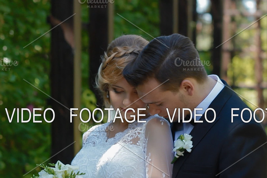 Bride and groom pose to photographer outdoor in Graphics - product preview 8