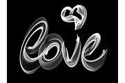 Love isolated word lettering and heart written with fire flame or smoke on black background