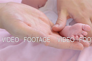 Foot massage newborn baby