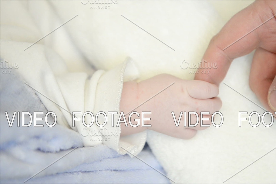 A new father holds his newborn infant baby's hand in Graphics - product preview 8