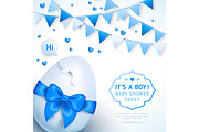 Boy baby shower with blue ribbon and cracked egg
