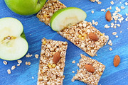 Cereal bars of granola with apples, nuts and honey