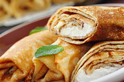 Rolled pancakes with cottage cheese