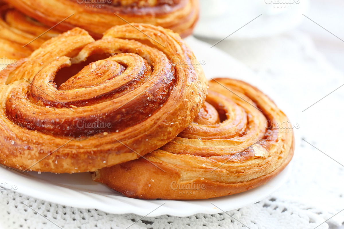 Baked sweet cinnamon rolls with cup of tea in Illustrations - product preview 8
