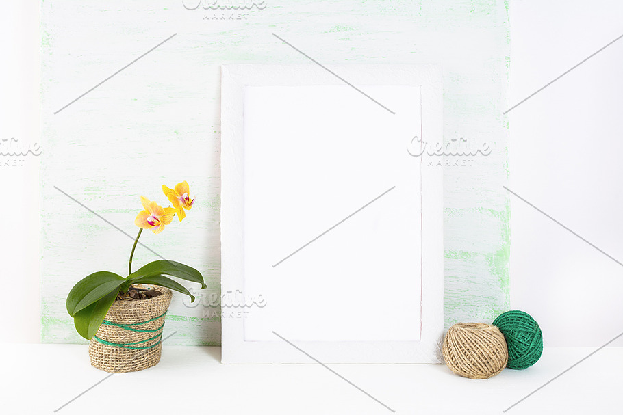 White frame mockup with orchid