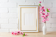 White frame mockup with pink flower