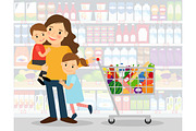 Woman in supermarket with kids
