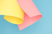 Pink, blue, yellow paper texture.