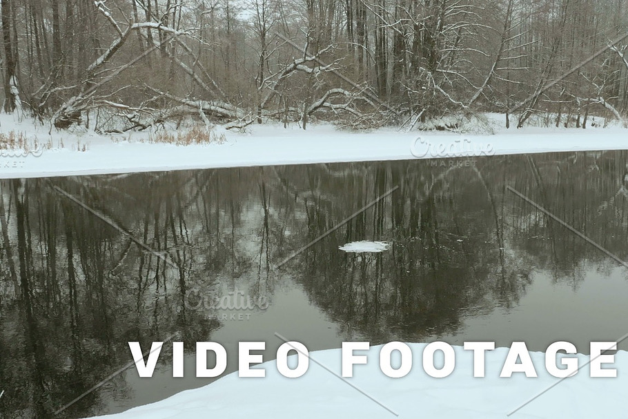 Block of ice float on the winter river. Used professional gimbal stabilazer