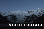 Mountains moon and sunrise - Elbrus area. Time-lapse