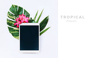 Tablet with tropical flowers