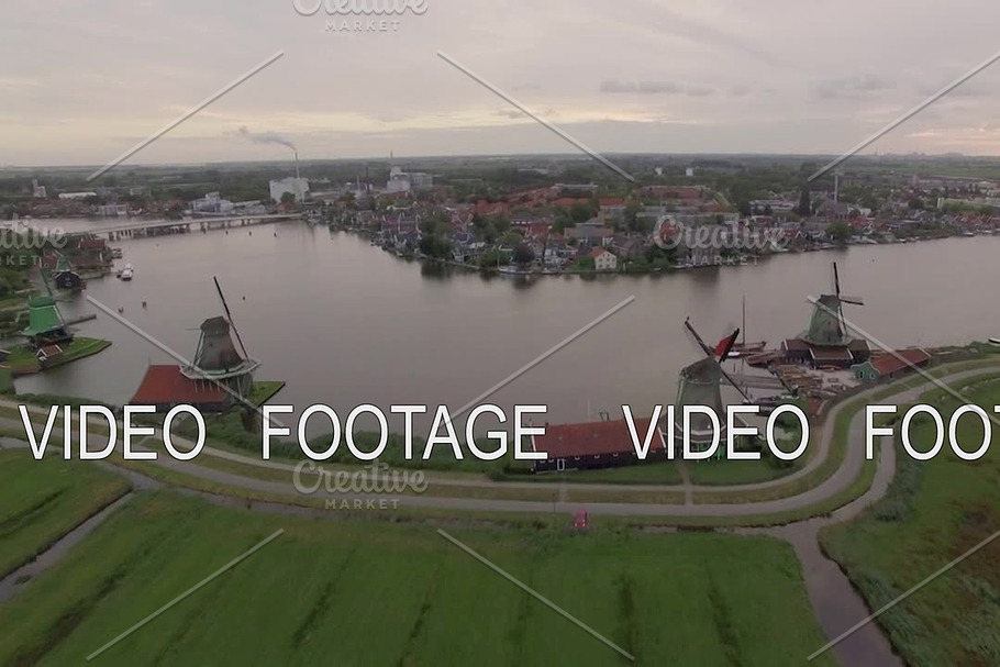 Aerial scene with windmills and township in Netherlands in Graphics - product preview 8