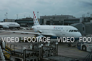 Timelapse view of aircraft in Frankfurt Airport against cloudy sky. Frankfurt am Main, Germany