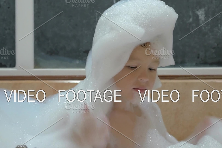 Child having fun with foam in the bath in Graphics - product preview 8