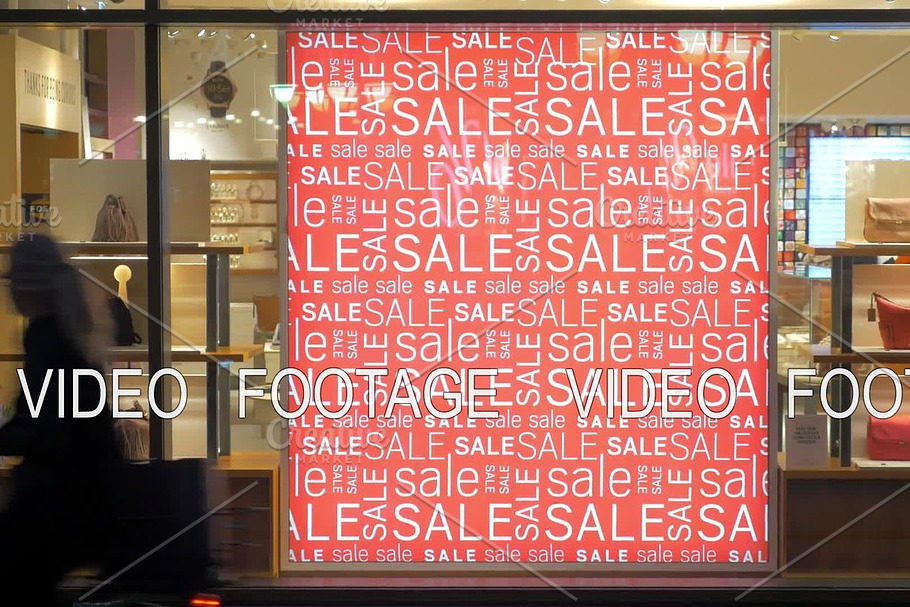 Store front with sale banner illuminated at night in Graphics - product preview 8
