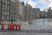 I amsterdam slogan on city background, Netherlands