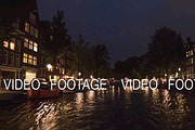 Timelapse of boat tour on Amsterdam canals at night