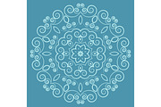 Round lacy vintage pattern on blue background