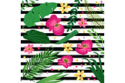 Beautiful botanical pattern with tropical flowers and foliage as banana palm tree leaves